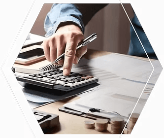 Hand calculating finance rate calculator desk