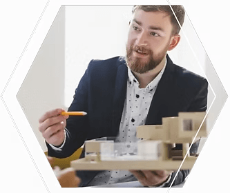 Man pointing at property model development finance